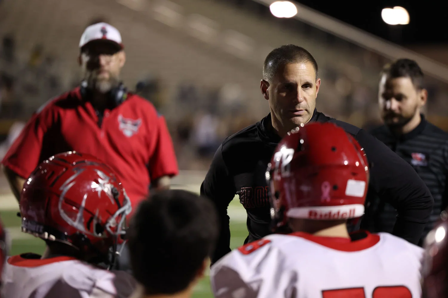 Coach talking to the team