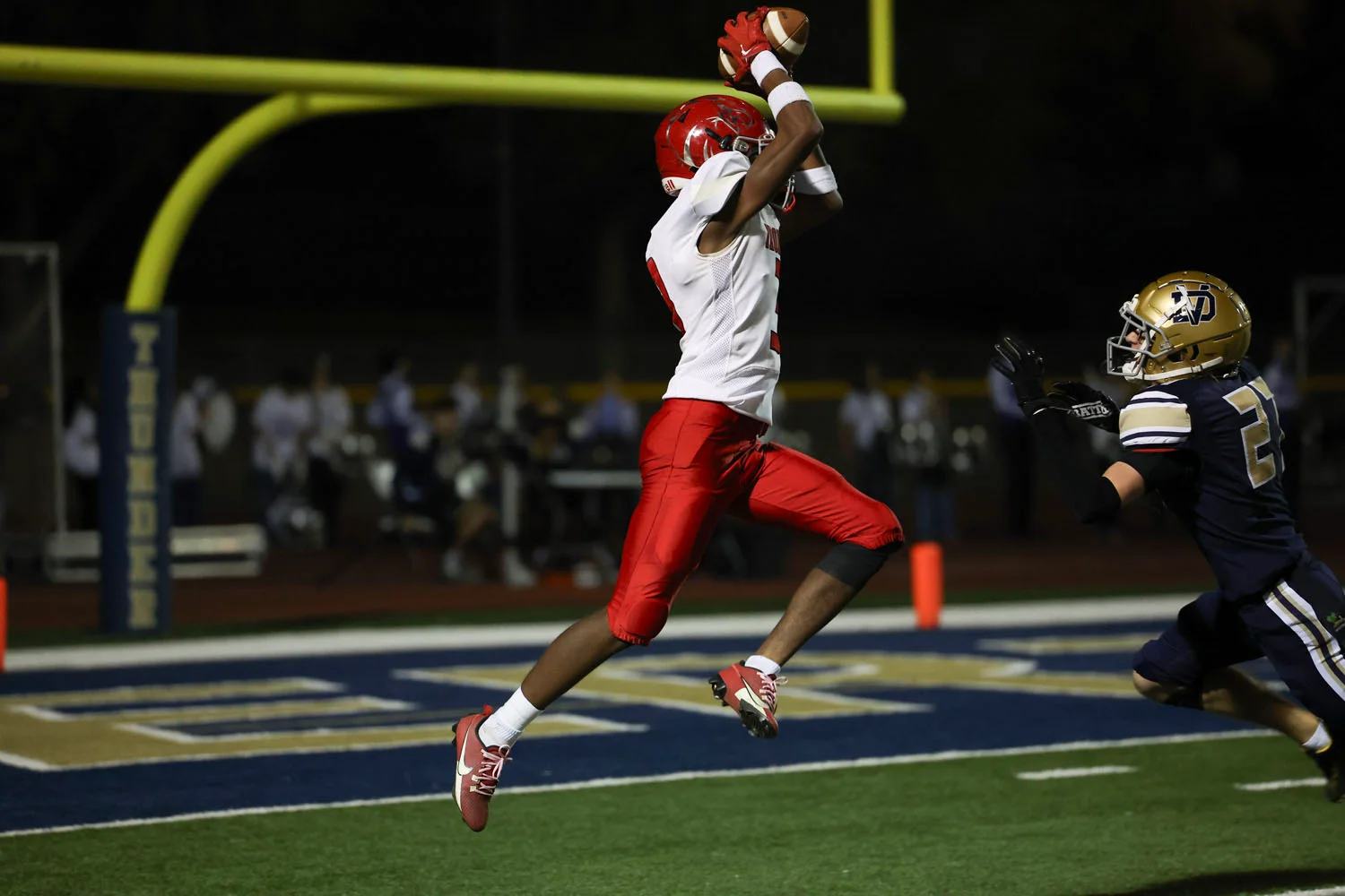 WR going up for the catch